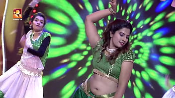 Her Supple Hips Sway, Drawing Your Gaze To The Deep, Inviting Hollow Of Her Navel As She Dances With Raw, Primal Energy.