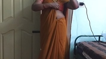 Sultry Desi Wife In Saree Teases With Her Big Boobs And Shaved Pussy, Rubbing And Pressing Hard As She Pleasures Herself