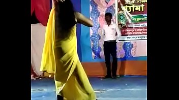 A Sultry Village Temptress Grinds And Writhes In A Provocative Ritual Dance On Stage.