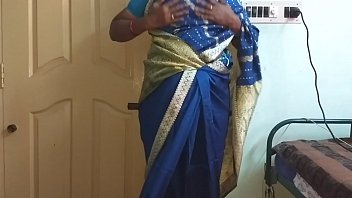 Sultry Tamil Temptress In A Sapphire Saree, Her Heavy Breasts Straining Against The Silk As She Teases Her Bare Pussy With Desperate, Hungry Fingers.