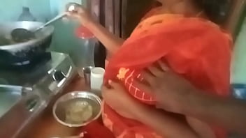 Aunty’s Steamy Kitchen Seduction: Her Skilled Hands Work His Throbbing Cock